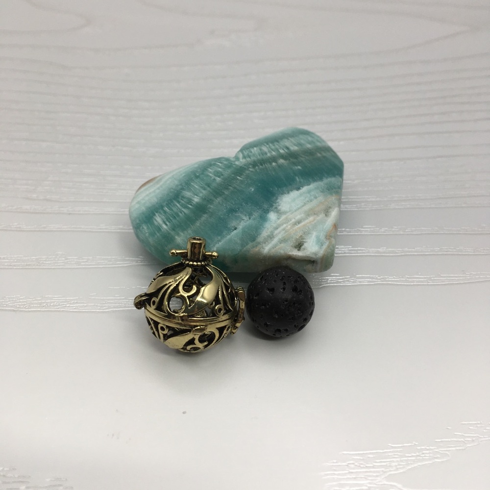 Leaf Pattern Aromatherapy Brass tone Locket.  Lava stone included.
